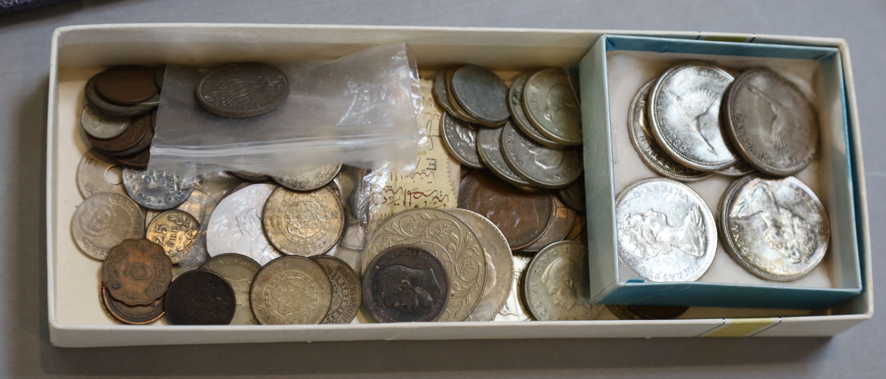 A collection of assorted coins and medallions